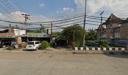 Bengkel ac batas kota