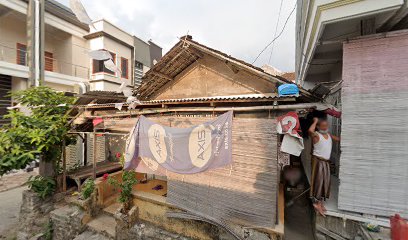 Bapak Mundhib Pijat Suwok