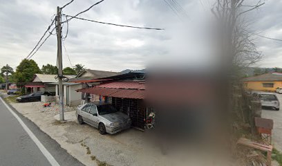 Kedai Gunting Rambut Kampung Melayu