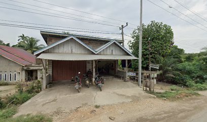 Khairul pangkas rambut