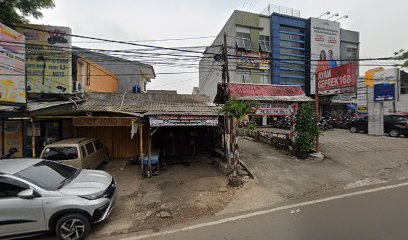 Tukang Gigi