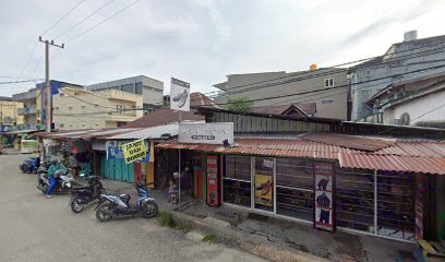 Penjahit pasar batu