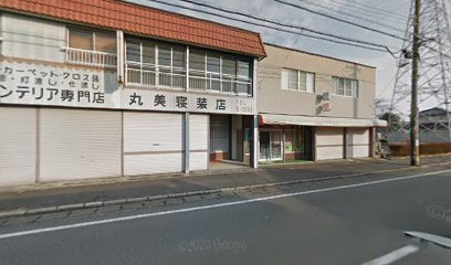 丸美寝装店