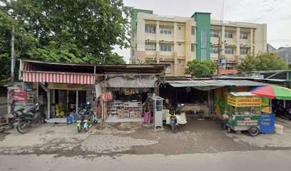 Potong Rambut Rapilo