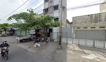 Penjualan Kembang Makam Bu Sar