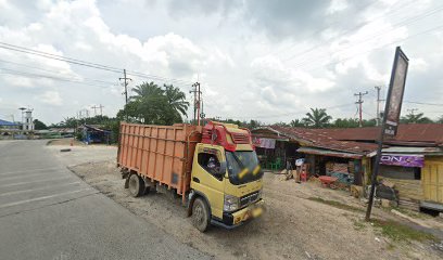 Toko Manullang